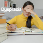 A white panel with the words – Dyspraxia – on it