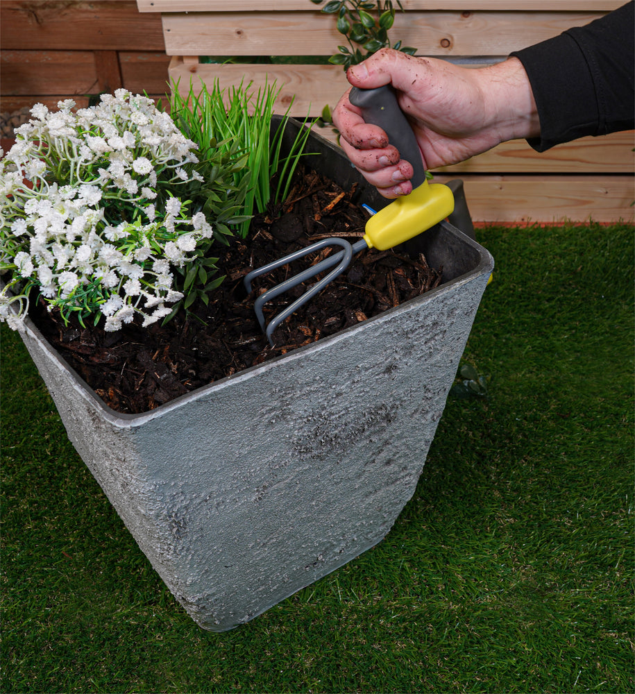 3 Piece Ergonomic Handled Gardening Set - cultivator being used